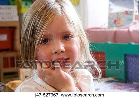 4 year old girl at nursery, smiling into camera View Large Photo Image Stock Photo - 4 year old girl at nursery, smiling into camera. Fotosearch