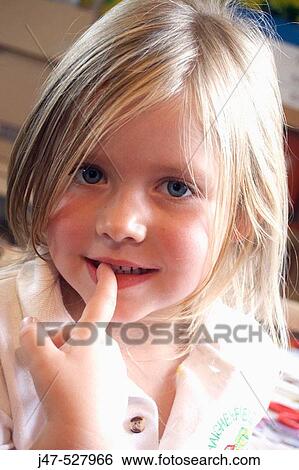 4 year old girl at nursery, smiling into camera; looking coy View Large Photo Image Stock Photograph - 4 year old girl at nursery, smiling into camera; looking coy. Fotosearch