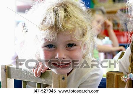 4 year old girl at nursery, smiling into camera View Large Photo Image Stock Photography - 4 year old girl at nursery, smiling into camera. Fotosearch