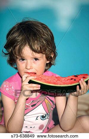 4 year old girl eating watermelon. View Large Photo Image Stock Photo - 4 year old girl eating watermelon.. Fotosearch
