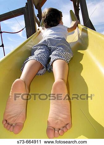 4 year old girl on slide View Large Photo Image Stock Image - 4 year old girl on slide. Fotosearch