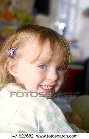 4 year old girl smiling into camera at nursery, View Large Photo Image Stock Image - 4 year old girl smiling into camera at nursery,. Fotosearch
