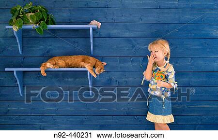4 year old girl. Trained cat. Fake mouse. View Large Photo Image Stock Image - 4 year old girl. Trained cat. Fake mouse.. Fotosearch