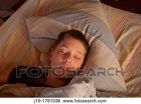 Stock Photo - 4 years is sleeping. Fotosearch