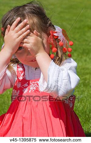 4 years old girl in red dress sitting on the grass. View Large Photo Image Stock Photography - 4 years old girl in red dress sitting on the grass.. Fotosearch