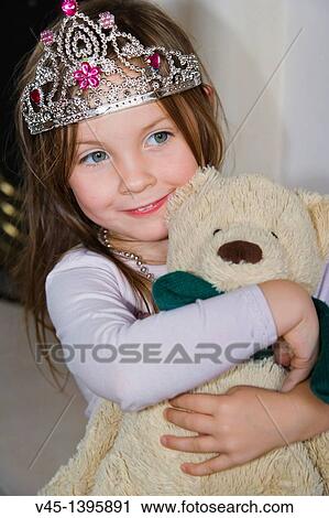 4 years old girl in tiara with teddy bear. View Large Photo Image Stock Image - 4 years old girl in tiara with teddy bear.. Fotosearch
