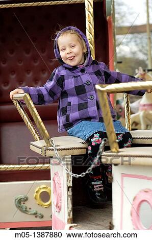 4 years old girl on a carousel in Paris, France View Large Photo Image Stock Image - 4 years old girl on a carousel in Paris, France. Fotosearch