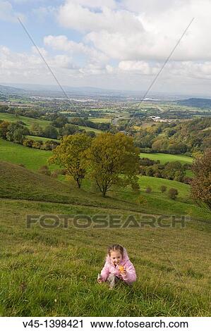 4 years old girl playing at Barrow Wake Viewpoint, Gloucestershire, England, UK. View Large Photo Image Stock Image - 4 years old girl playing at Barrow Wake Viewpoint, Gloucestershire, England, UK.. Fotosearch