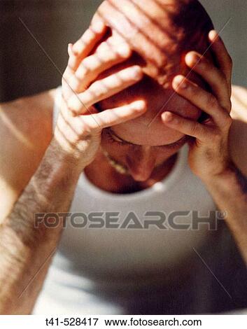 40 year old, bald man leans over his morning paper. View Large Photo Image Stock Photo - 40 year old, bald man leans over his morning paper.. Fotosearch