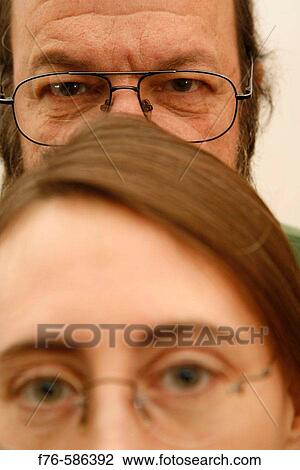 40 year old woman with man behind her View Large Photo Image Stock Image - 40 year old woman with man behind her. Fotosearch