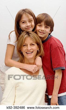 44 year old woman with her 10 year old daughter and 7 year old son View Large Photo Image Stock Photograph - 44 year old woman with her 10 year old daughter and 7 year old son. Fotosearch