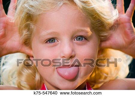 5 year old Caucasian blonde girl playful View Large Photo Image Stock Image - 5 year old Caucasian blonde girl playful. Fotosearch