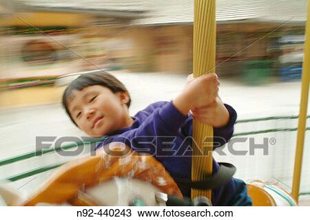 5 year old chinese girl at fair View Large Photo Image Stock Image - 5 year old chinese girl at fair. Fotosearch