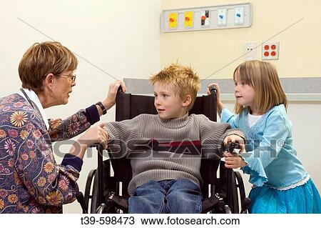 5 year old girl and 7 year old boy in a hospital room with a nurse, the boy is in a wheelchair. View Large Photo Image Stock Image - 5 year old girl and 7 year old boy in a hospital room with a nurse, the boy is in a wheelchair.. Fotosearch