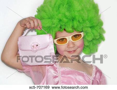 Stock Photo - 5 year old girl in fancy dress. Fotosearch