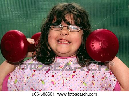 5 year old girl lifting weights View Large Photo Image Stock Image - 5 year old girl lifting weights. Fotosearch