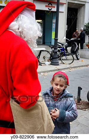5 year old girl with Santa Claus View Large Photo Image Stock Photograph - 5 year old girl with Santa Claus. Fotosearch