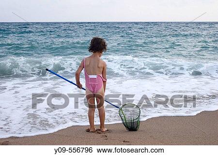 5 years old girl on the beach. View Large Photo Image Stock Photograph - 5 years old girl on the beach.. Fotosearch