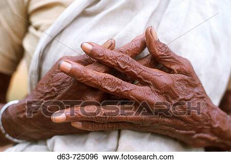 Stock Photograph - 5368 INDIA - AGEING HANDS OF OLD WOMAN KERALA. Fotosearch