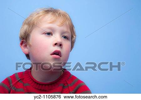 6 year old boy watching TV indoors in the Uk View Large Photo Image Stock Photograph - 6 year old boy watching TV indoors in the Uk. Fotosearch