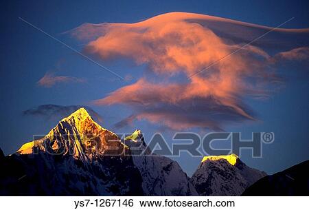 6000 meters high peak seen at sunset from Tengboche monastery on Everest trail, Khumbu region, Nepal View Large Photo Image Stock Photograph - 6000 meters high peak seen at sunset from Tengboche monastery on Everest trail, Khumbu region, Nepal. Fotosearch
