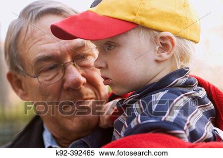 62 year old man and his 2 year old grandson View Large Photo Image Stock Photography - 62 year old man and his 2 year old grandson. Fotosearch