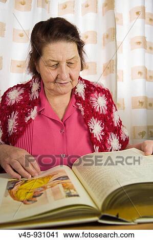67 years old woman reading bible View Large Photo Image Stock Image - 67 years old woman reading bible. Fotosearch