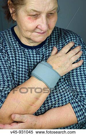 67 years old woman taking her blood pressure with tonometer View Large Photo Image Stock Photography - 67 years old woman taking her blood pressure with tonometer. Fotosearch