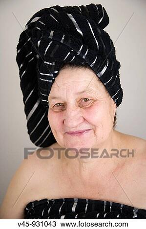 67 years old woman with a towel on her head View Large Photo Image Stock Image - 67 years old woman with a towel on her head. Fotosearch