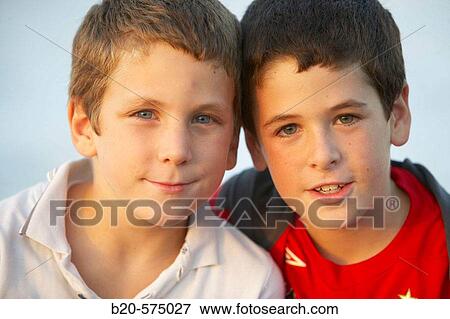 Stock Photo - 7 to 9 year old children, brothers.. Fotosearch