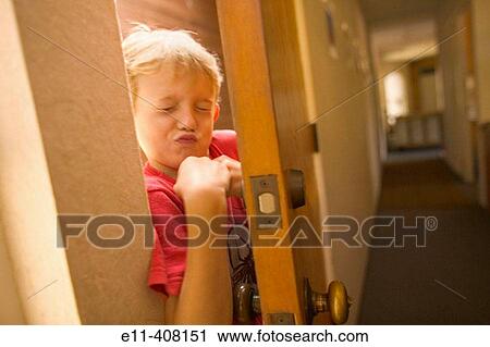 7 year old boy entering house front door, Laguna Beach, California, USA View Large Photo Image Stock Image - 7 year old boy entering house front door, Laguna Beach, California, USA. Fotosearch