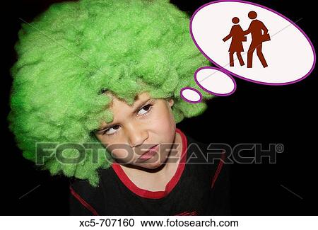 Stock Image - 7 year old boy thinking about school. Fotosearch