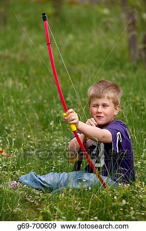 7 year old boy with a bow, Vasterbotten, Sweden (June 2005) View Large Photo Image Stock Photo - 7 year old boy with a bow, Vasterbotten, Sweden (June 2005). Fotosearch