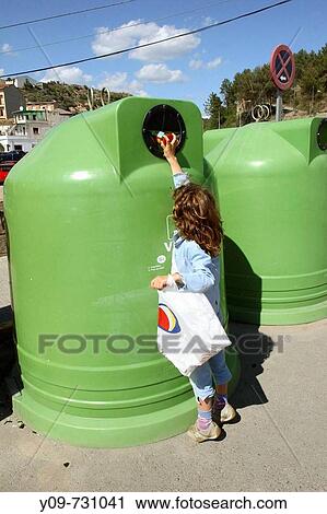7 year old girl throwing a bottle in a recycling bin View Large Photo Image Stock Image - 7 year old girl throwing a bottle in a recycling bin. Fotosearch