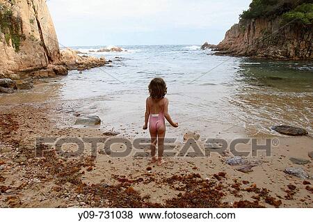 7 year old girls on beach, Aigua Xelida cove, Tamariu, Costa Brava. Baix Emporda, Girona province, Catalonia, Spain View Large Photo Image Stock Photo - 7 year old girls on beach, Aigua Xelida cove, Tamariu, Costa Brava. Baix Emporda, Girona province, Catalonia, Spain. Fotosearch