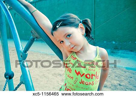 7 years old girl on the playground View Large Photo Image Stock Photography - 7 years old girl on the playground. Fotosearch