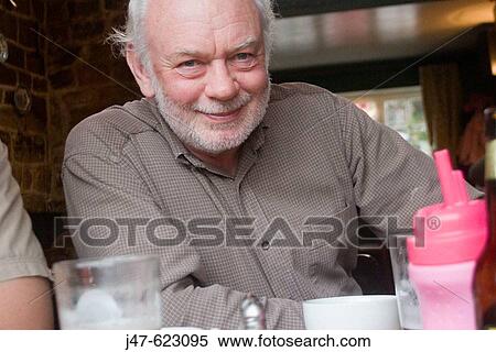 70 year old man smiling into camera View Large Photo Image Stock Photography - 70 year old man smiling into camera. Fotosearch