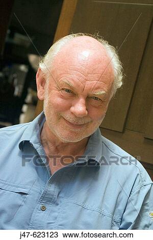 70 year old man with grey hair and a beard smiling into camera View Large Photo Image Stock Image - 70 year old man with grey hair and a beard smiling into camera. Fotosearch