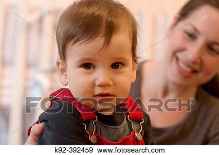 Stock Photo - 8 month old boy and his 33 year old mother. Fotosearch