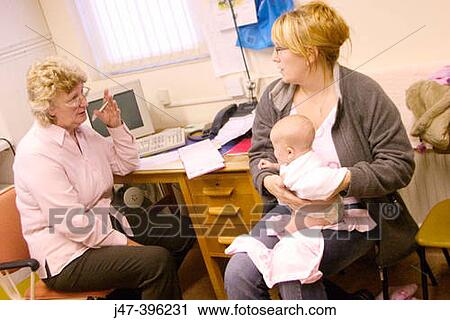 8 week old baby at doctors surgery, having her first health check-up with the health visitor View Large Photo Image Stock Image - 8 week old baby at doctors surgery, having her first health check-up with the health visitor. Fotosearch