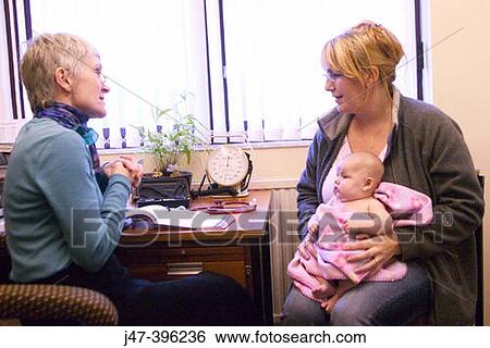 8 week old baby at doctors surgery, having her first health check-up with the doctor View Large Photo Image Stock Photograph - 8 week old baby at doctors surgery, having her first health check-up with the doctor. Fotosearch