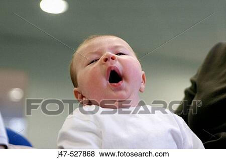 8 week old baby yawning View Large Photo Image Stock Photo - 8 week old baby yawning. Fotosearch