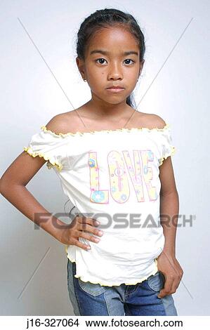 Picture - 8 year old Asian Afro-American girl. Fotosearch