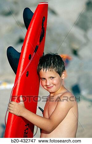 8 year old boy with surfboard on beach, Hendaye. Aquitaine, France View Large Photo Image Stock Photo - 8 year old boy with surfboard on beach, Hendaye. Aquitaine, France. Fotosearch