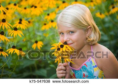 8 year old Caucasian blonde girl with black-eyed susans flowers View Large Photo Image Stock Photo - 8 year old Caucasian blonde girl with black-eyed susans flowers. Fotosearch