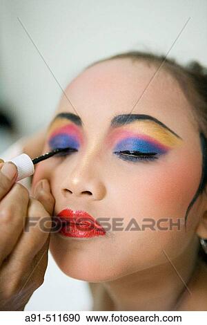 8 years old female dancer at her dance teacher home for make-up and practising Legong Kraton dance. Gyanar. Island of Bali. Indonesia View Large Photo Image Stock Image - 8 years old female dancer at her dance teacher home for make-up and practising Legong Kraton dance. Gyanar. Island of Bali. Indonesia. Fotosearch