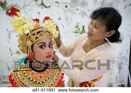 8 years old female dancer at her dance teacher home for make-up and practising Legong Kraton dance. Gyanar. Island of Bali. Indonesia View Large Photo Image Stock Image - 8 years old female dancer at her dance teacher home for make-up and practising Legong Kraton dance. Gyanar. Island of Bali. Indonesia. Fotosearch