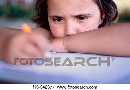8 years old girl studying homework View Large Photo Image Stock Photo - 8 years old girl studying homework. Fotosearch