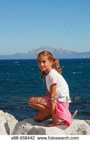 Stock Image - 9 year old Spanish girl in Tarifa. CBdiz. Andalucia. Spain.. Fotosearch