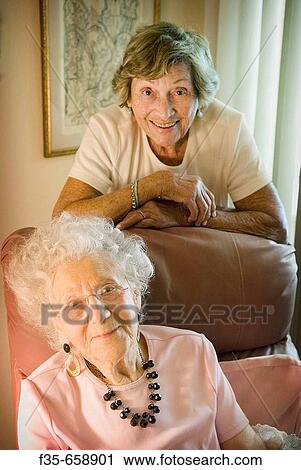 Stock Image - 90 and 100 year old women. Fotosearch